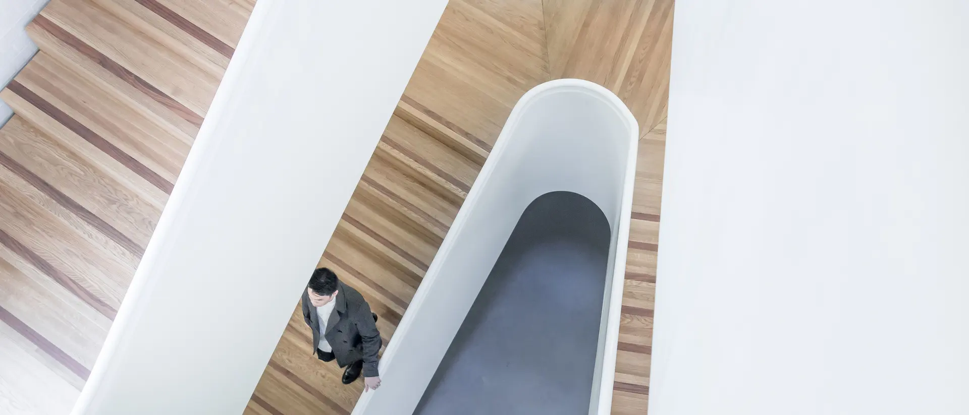 An apartment stairwell and railing.